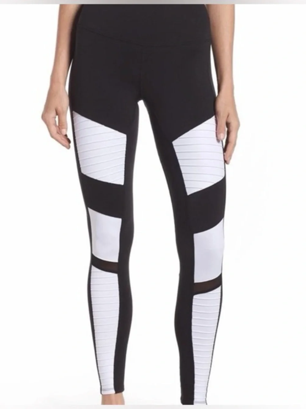 ALO Yoga Moto Leggings in a black and white